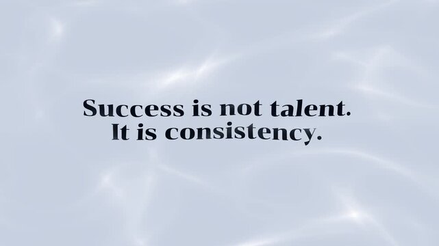 Inspirational quote success is not talent it is consistency on a soft blue abstract water ripple background