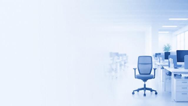 Empty blue office chair in a bright modern office with copy space, recruitment and labor shortage concept
