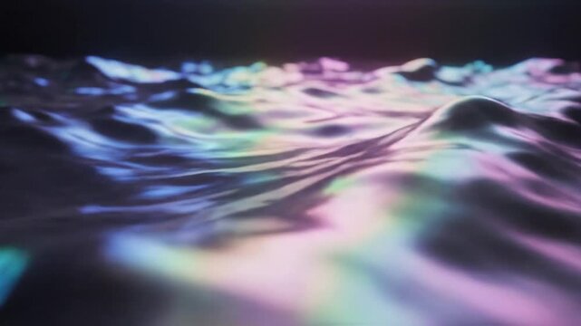 Iridescent holographic liquid waves with soft lighting.
