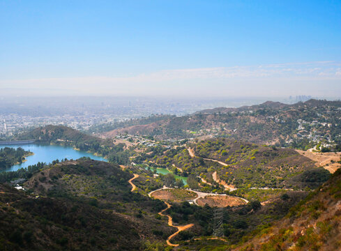 Skyline of Los Angeles as seen from the Wonder View Trailhead to Wisdom Tree on Cahuenga Peak during a summer season in Los Angeles, California, USA
