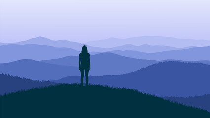 A person stands alone on a hill overlooking a serene mountain landscape at dusk. © Grogolan