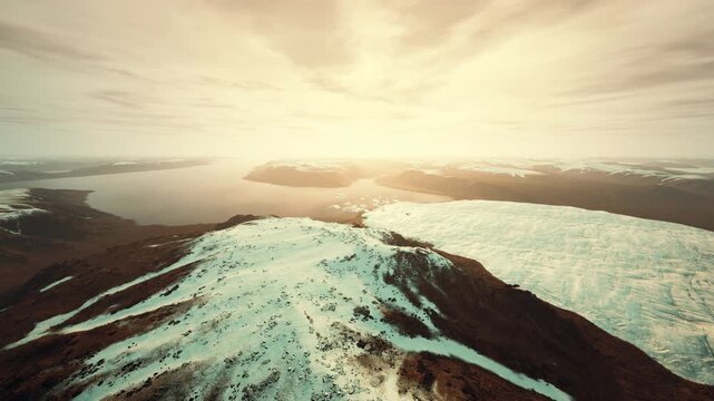 aerial sunrise over glacier ridge with golden light and distant horizon, sweeping snowfields and jagged crevasses, calm mood with vast scale and remote