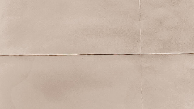 Beige textured concrete background, perfect for a minimalist desktop wallpaper.