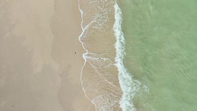 Tropical Nature sand sea and summer sea water with beautiful bright sunlight. Perfect for summer vacation and travel background	