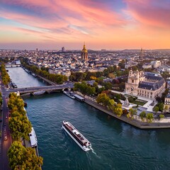 Obraz premium Aerial cityscape with river cruise at sunset