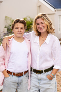 portrait of young woman and her younger brother