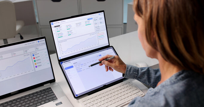 Mature Marketing Manager Analyzes Real-time Ad Campaign Data