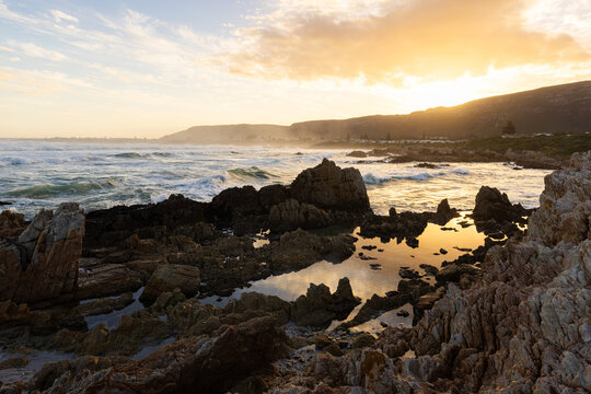 Sunset and dusk settling over beautiful Kammabaai Beach, Hermanus, South Africa