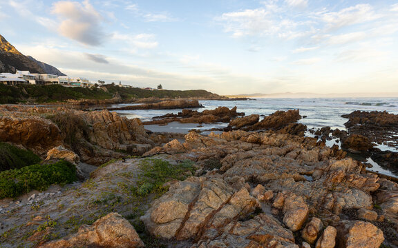 Sunset and dusk settling over beautiful Kammabaai Beach, Hermanus, South Africa