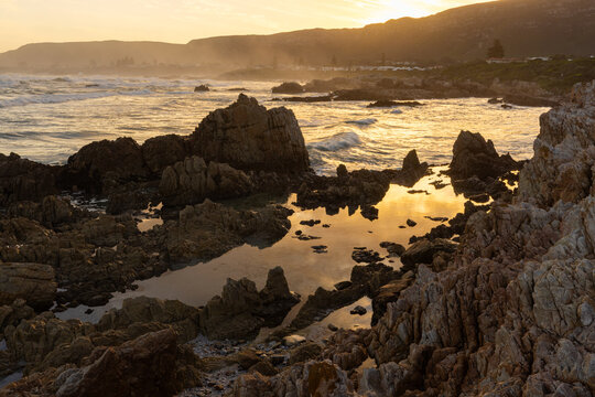 Sunset and dusk settling over beautiful Kammabaai Beach, Hermanus, South Africa