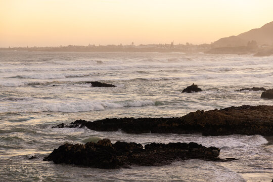 Sunset and dusk settling over beautiful Kammabaai Beach, Hermanus, South Africa