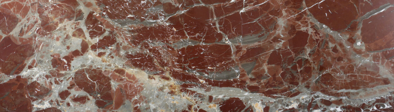 Luxury red onyx marble breccia horizontal panoramic texture background, premium hotel reception and upscale mansion public cladding surface