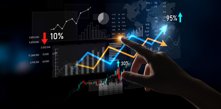 A close-up of a hand interacting with dynamic financial data displays, illustrating trends, graphs, and metrics to enhance investment decision-making and market understanding. Scalp