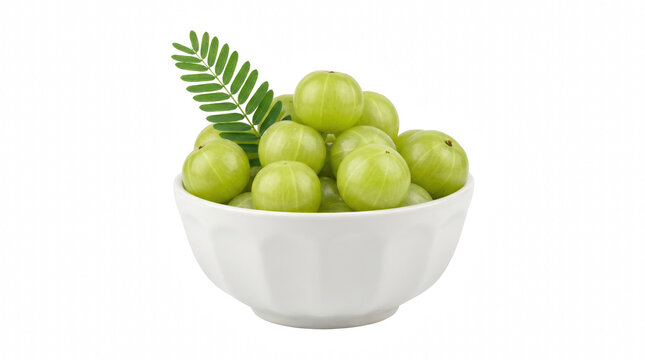 Fresh amla fruits with a leaf in a white ceramic bowl