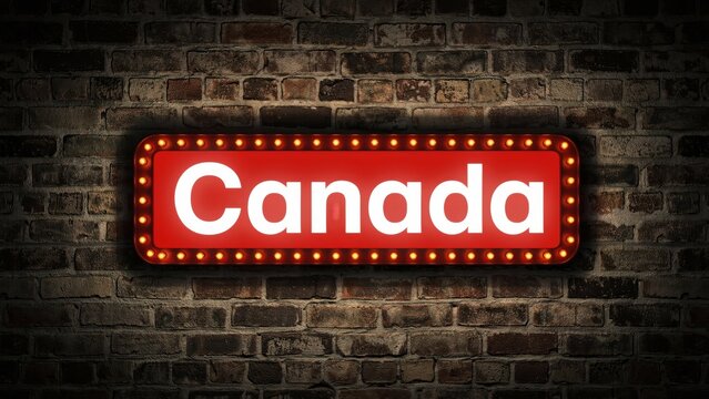 Red illuminated Canada marquee sign on dark brick wall background