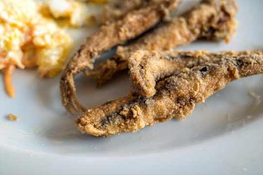 Close up of traditional fried fish.