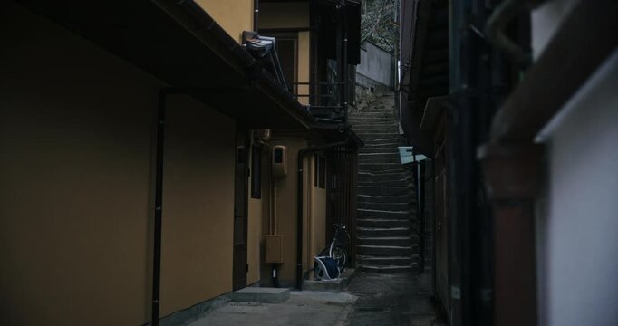 Narrow Alley Stone Staircase Between Traditional Buildings  In Hiroshima Japan - Tracking Shot