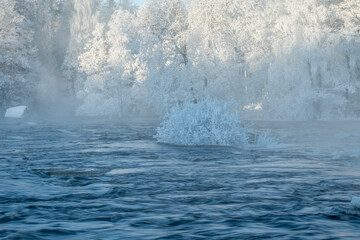 Naklejka premium River landscape with snow and frost. Farnebofjarden national park in winter.