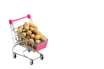Roasted peanuts in shells in a shopping cart on a white background © AI-Valentin