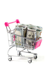 Dollars in a shopping cart on a white background, business and finance © AI-Valentin