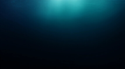 Obraz premium Deep blue ocean water background, abstract underwater background with light rays shining through the surface