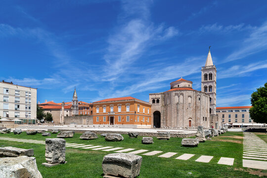 Saint Donatus Church and Roman Forum square in Zadar Croatia wide view. Ancient architecture sunny sky