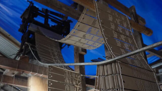 Jacquard punched cards creating intricate saree designs