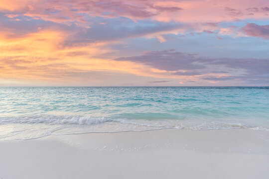 Sea sand sky concept, sunset colors clouds, horizon, horizontal background banner. Gorgeous nature landscape, beautiful colors, wonderful sun rays, tropical beach. Mediterranean sunset summer vacation