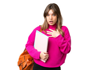 Obraz premium Young student girl over isolated chroma key background surprised and shocked while looking right