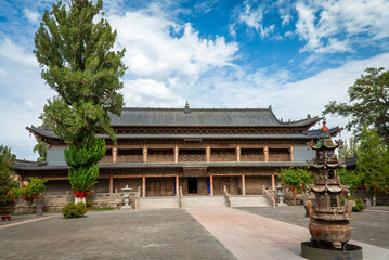 Naklejka premium Ancient Giant Buddha Temple in Gansu, China – Historic Silk Road Landmark