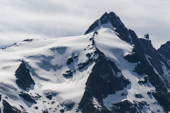 Snowfields and Rugged Slopes in Clear Alpine Light