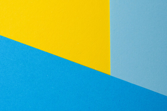 Vibrant yellow and blue shapes create a playful design in art
