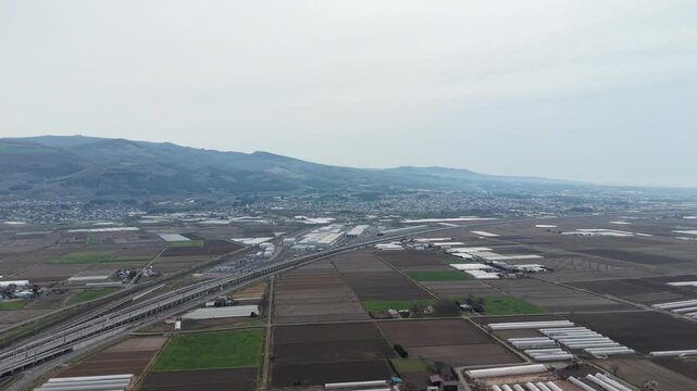 HOKKAIDO.  JAPAN .Modern town area with transport lines April 27 2026