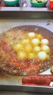Marinated Meat Cooking with White Onions at a Mexican Street Food Stall