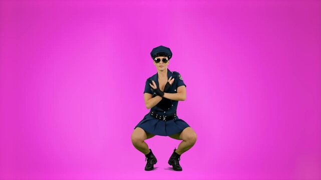 A live-action style 3D or video element of a performer dressed in a dark blue police uniform and sunglasses dancing energetically. The character performs dynamic dance steps against a vibrant pink bac