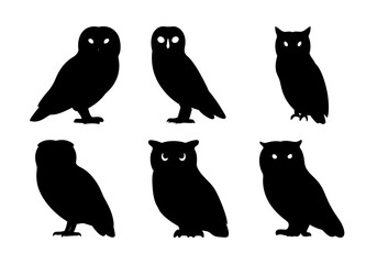 Fototapeta premium Six black silhouettes of different owl styles - A clean set of six stylized black owl silhouettes in various poses, perfect for nature, fantasy, or educational projects.