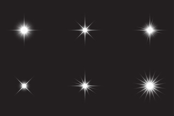 Fototapeta premium Collection of six different white glowing star and sparkle effects isolated on a dark background, perfect for adding magical or festive highlights to designs.