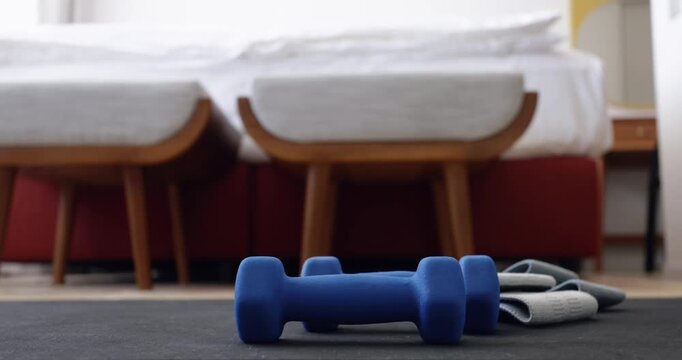 Fitness routine with dumbbells, simple home workout and daily movement motivation