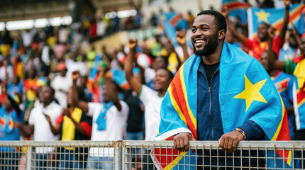 Obraz premium DR Congo football supporter celebrating in stadium crowd