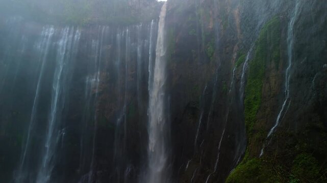 Java Island Indonesia Scenic Aerial Footage of Tumpak Sewu Waterfall in Cloudy Conditions