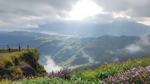 Panaromic timelapse of moving clouds and bloomed flowers at Ratangad Fort, Bhandardara, Maharashtra.