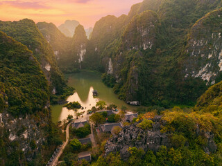 Aerial view Tranquil pagoda on water in Ninh Binh, Vietnam's scenic landscape