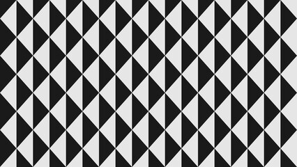 Fototapeta premium A repeating grid of black and white geometric visual design.