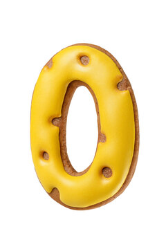 Gingerbread cookie shaped as a number zero with bright yellow icing isolated. Transparent PNG image.