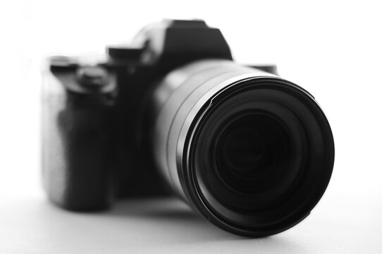 Digital mirrorless professional photo camera body isolated on transparent white background photo camera mockup mockup template blank lens objective Front view