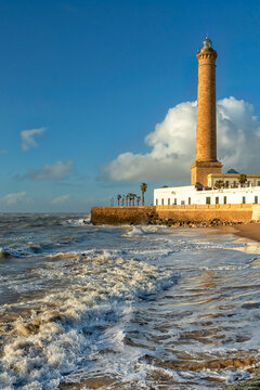 Spain. Chipiona Lighthouse on the Ocean Shore. Sea travel and tourism, Atlantic	