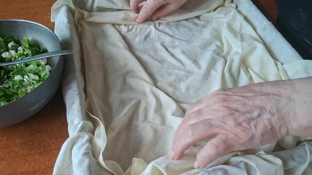 Layering Phyllo Dough for Traditional Turkish Borek
