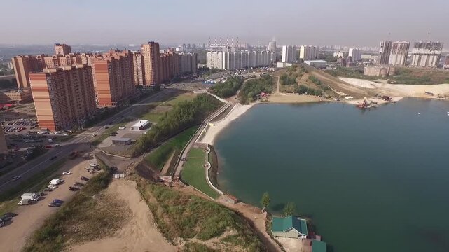 Drone flying back above Dzerzhinsky pond coast