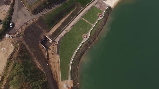 Drone lowering above Dzerzhinsky pond promenade
