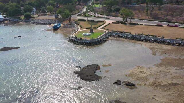 Aerial footage of Sattahip district located in Chomburi province.